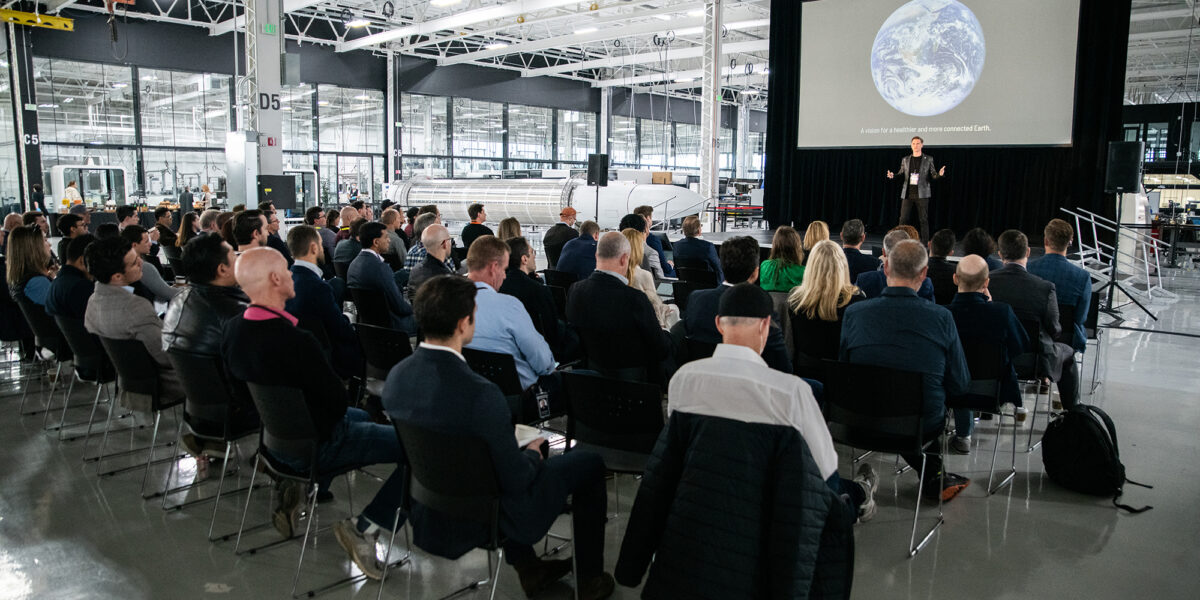 A Photo From Astra'S Spacetech Day, Showing The Live Audience Seated Before The Stage.