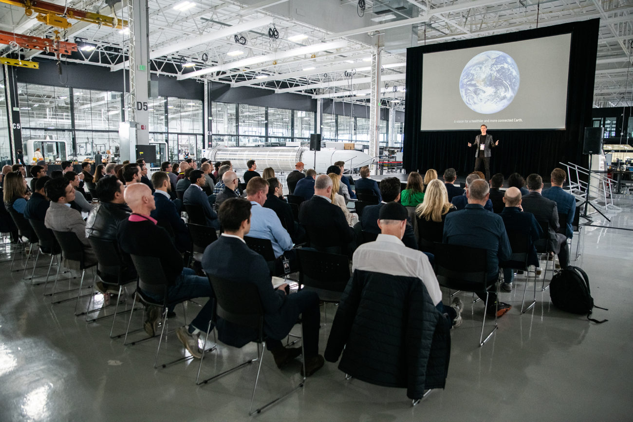 A photo from Astra's Spacetech Day, showing the live audience seated before the stage.